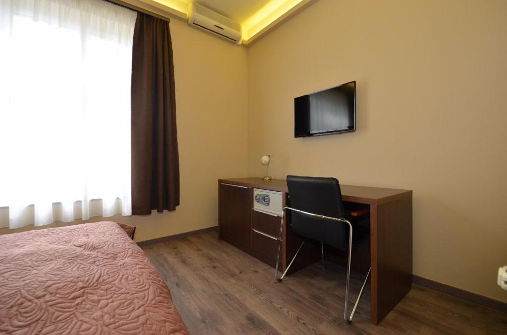 TV a/nebo společenská místnost v ubytování Fig Tree House