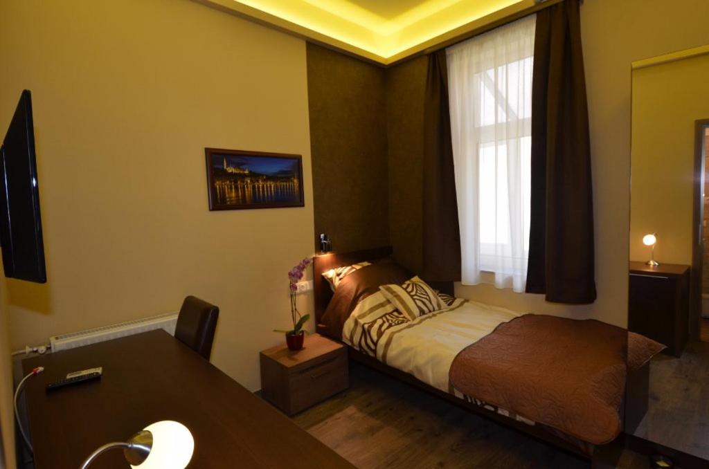 Postel nebo postele na pokoji v ubytování Fig Tree House
