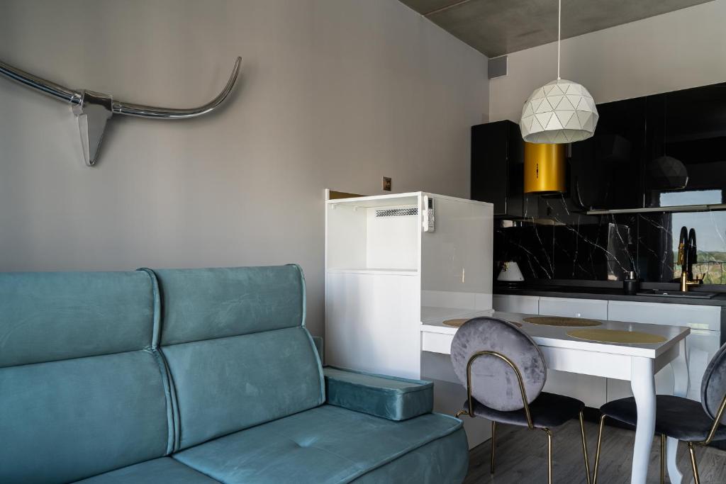 Kuchyňa alebo kuchynka v ubytovaní RentPlanet - Apartamenty Zarembowicza
