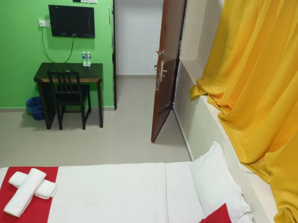 TV a/nebo společenská místnost v ubytování EZI HOTEL KLANG