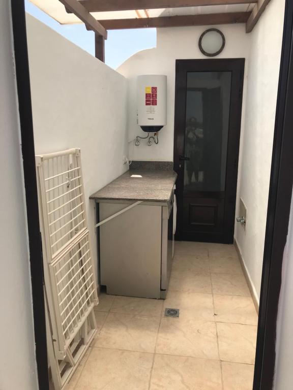 A kitchen or kitchenette at Casa Dylan