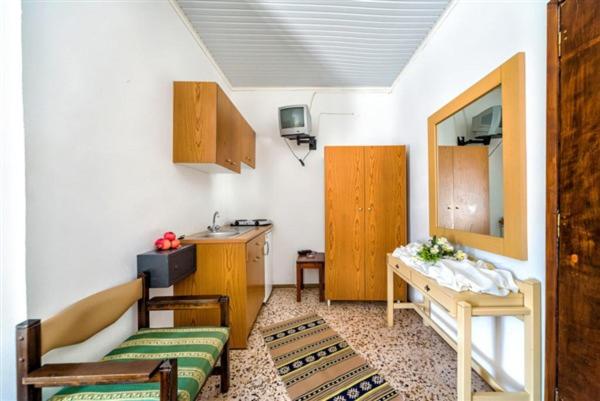 Kuchyň nebo kuchyňský kout v ubytování Harmony Hotel & Studio