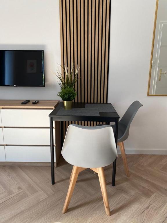 Televízia a/alebo spoločenská miestnosť v ubytovaní Grabowska 8 by Homeprime