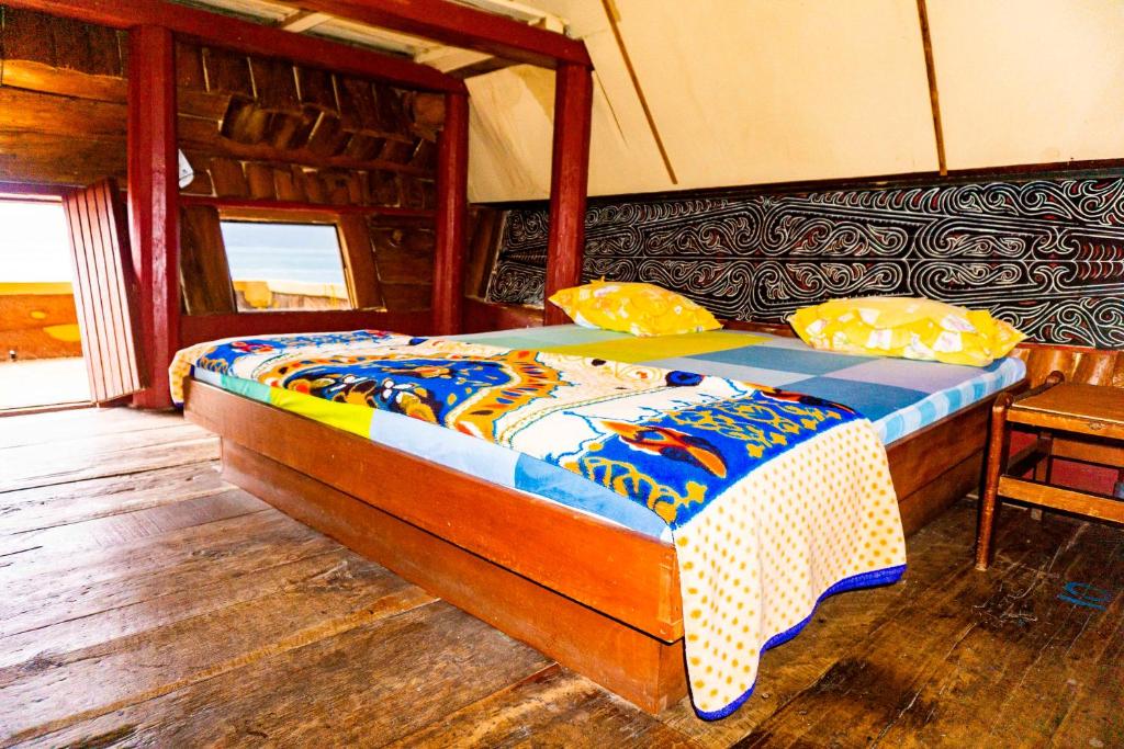 Postel nebo postele na pokoji v ubytování Reggae Guest House