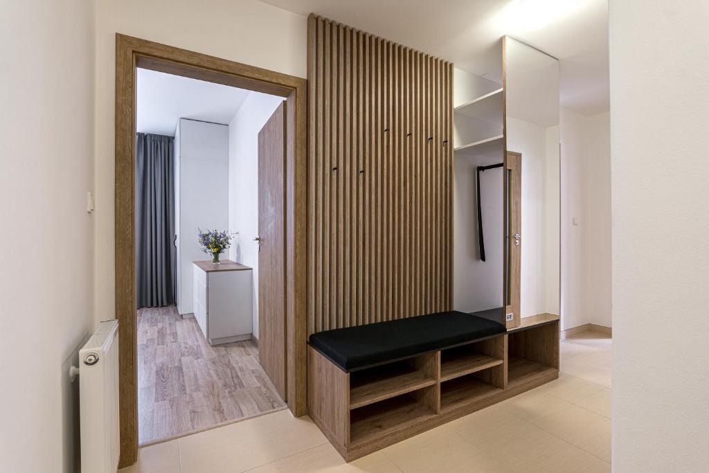 Postel nebo postele na pokoji v ubytování Hubertus Karlova Studánka