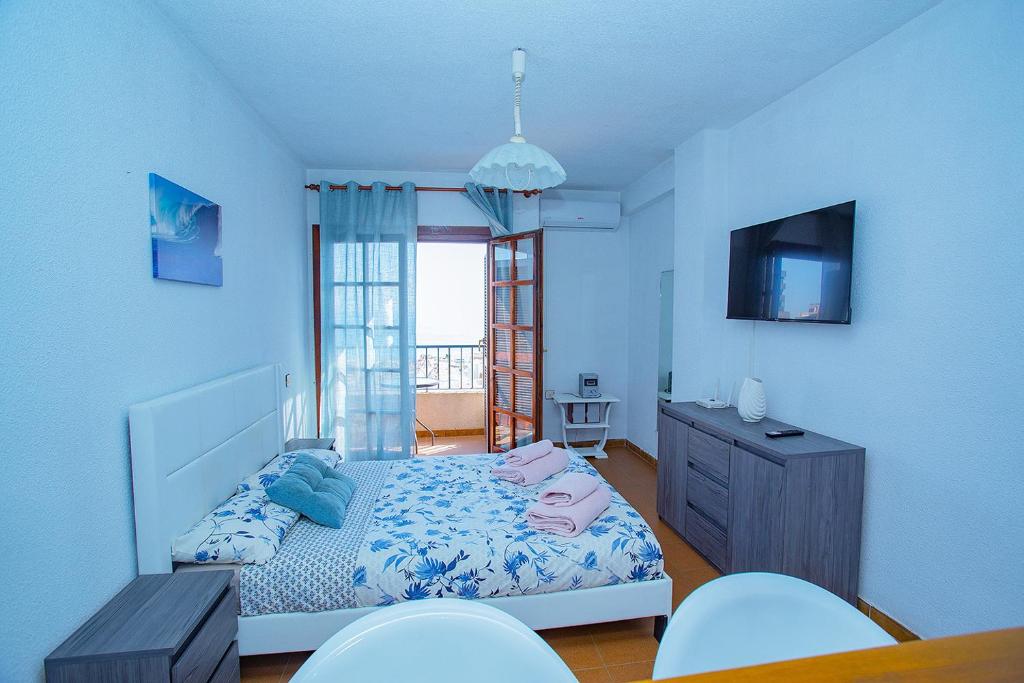 A television and/or entertainment centre at 042 Peaceful Mar View - Alicante Holiday