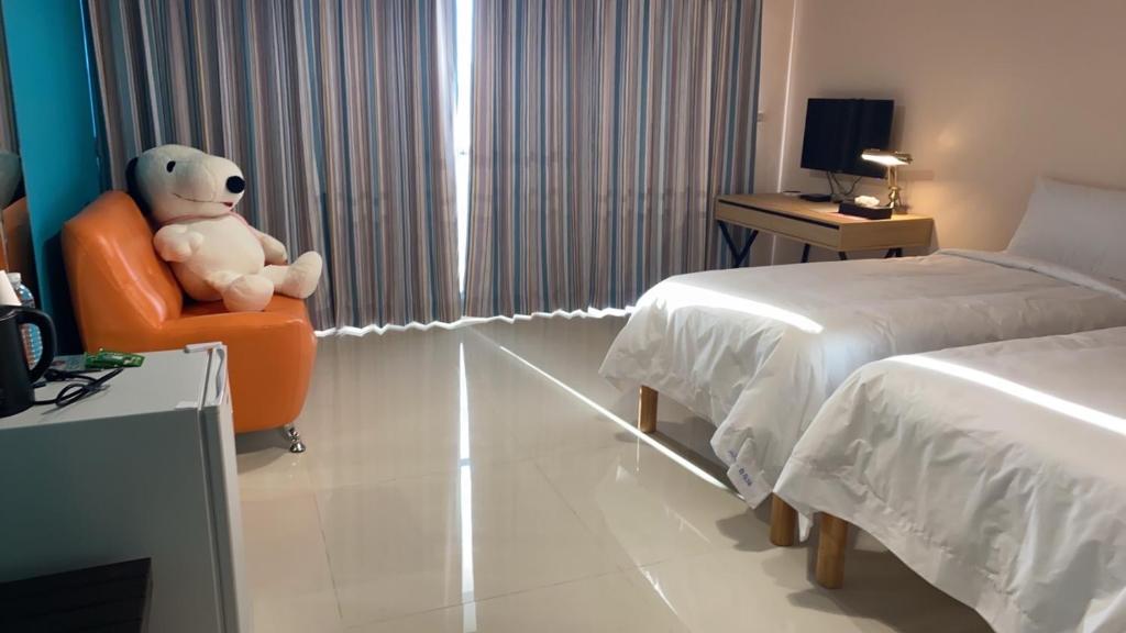 Postel nebo postele na pokoji v ubytování Shui Shang Yuan Homestay