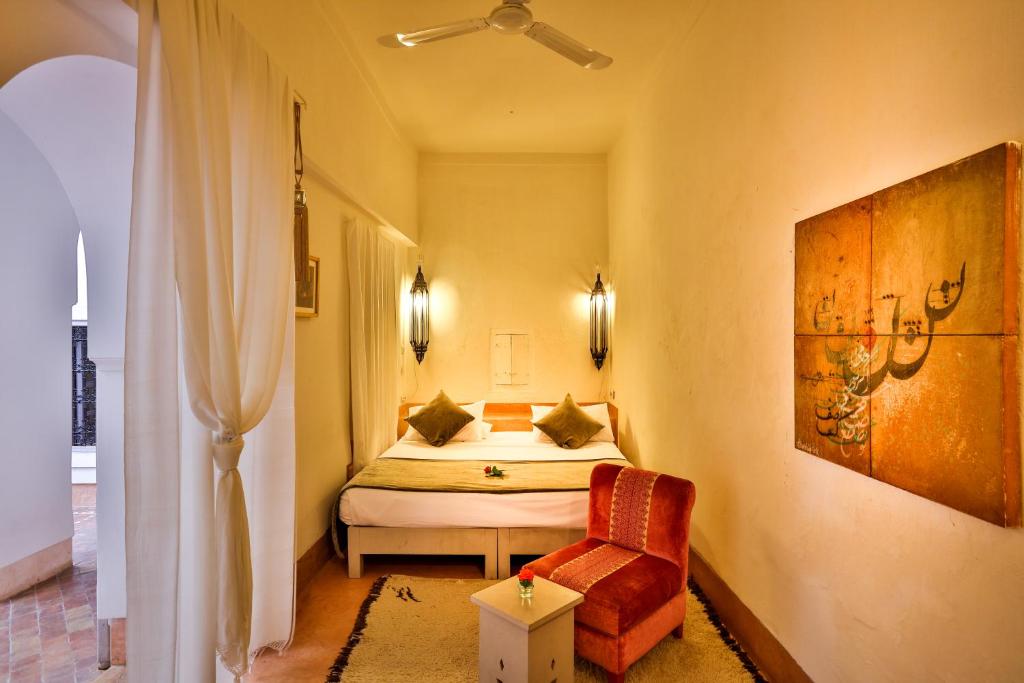 Postel nebo postele na pokoji v ubytování Hotel & Spa Riad Al Jazira