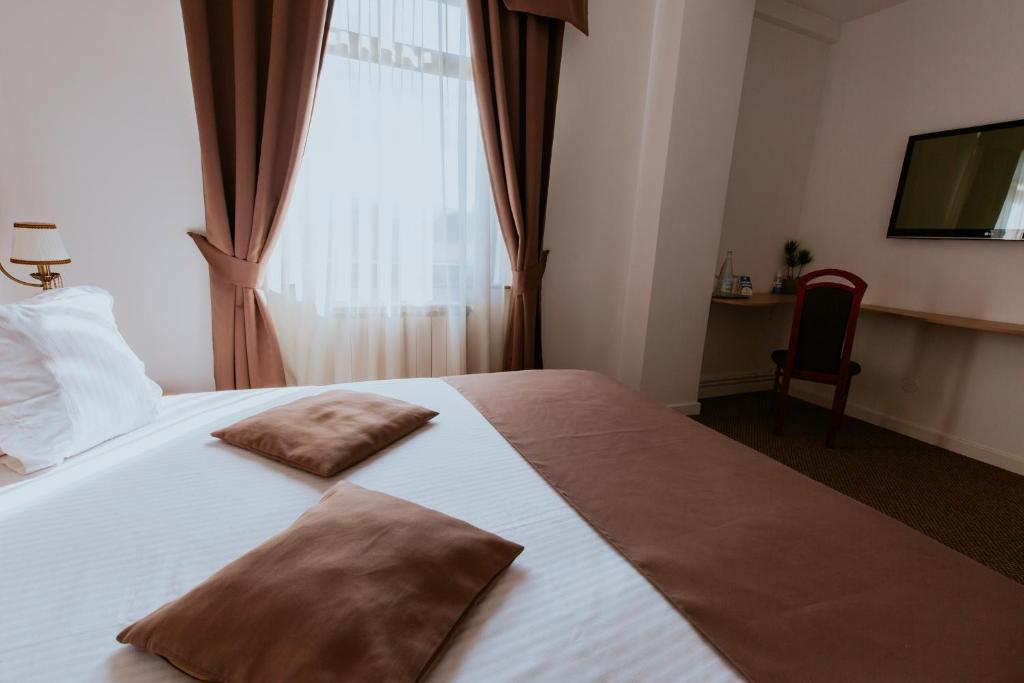 Postel nebo postele na pokoji v ubytování Hotel Restaurant Park