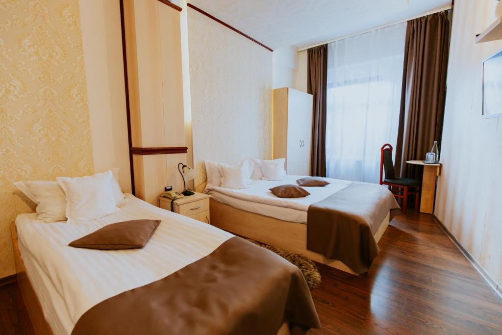 Postel nebo postele na pokoji v ubytování Hotel Restaurant Park