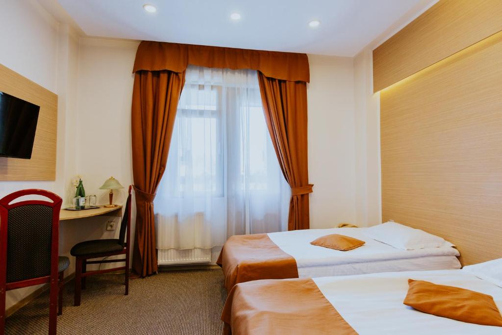 Postel nebo postele na pokoji v ubytování Hotel Restaurant Park