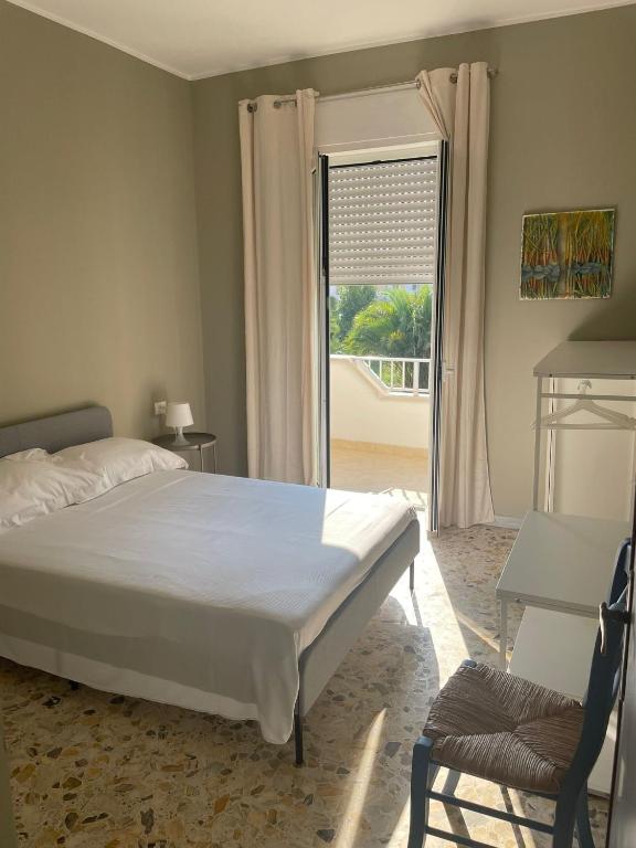 A bed or beds in a room at HS Easy holiday home