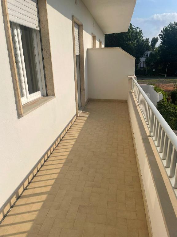 A balcony or terrace at HS Easy holiday home