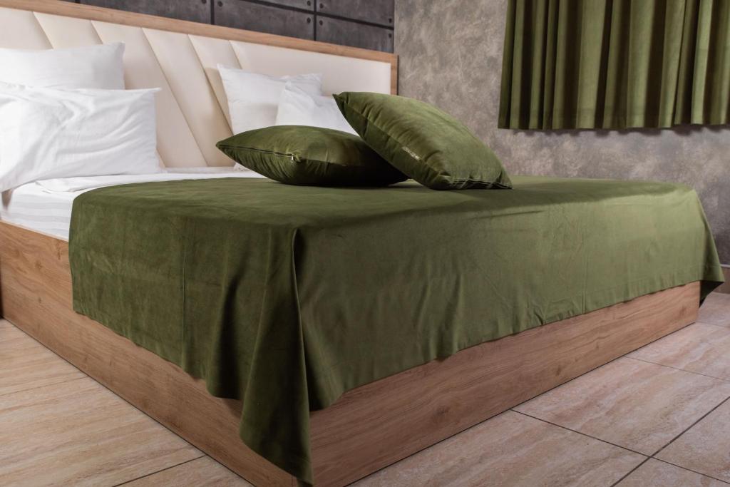 Postel nebo postele na pokoji v ubytování Avan Plaza Hotel