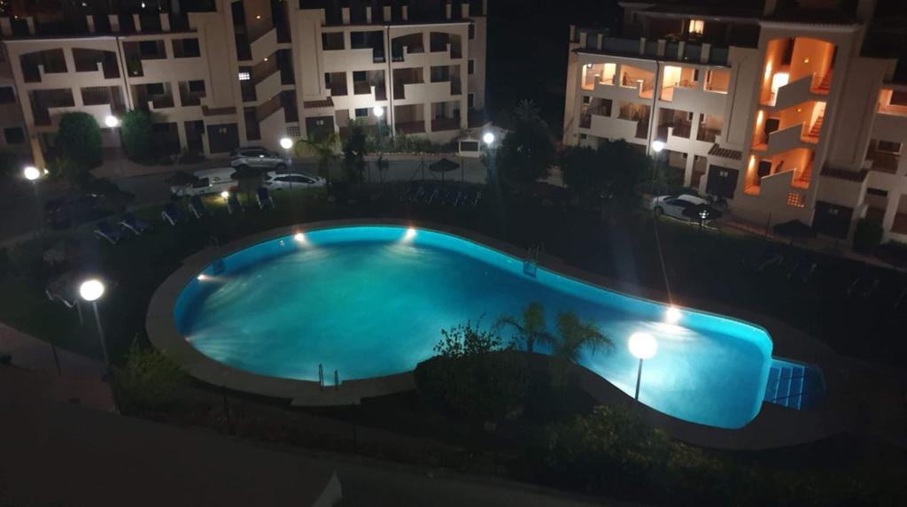 Bazén v ubytovaní Apartamento en Calanova Golf- Cala de Mijas alebo v jeho blízkosti