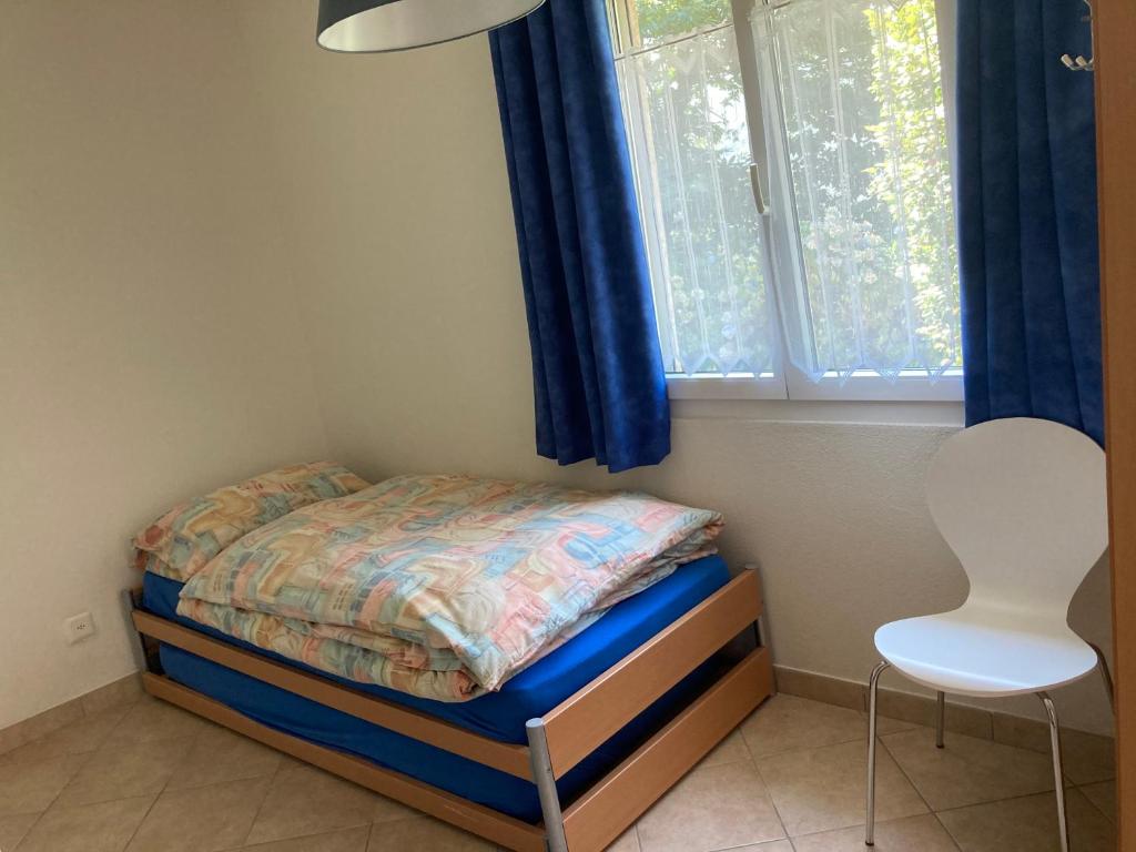 Postel nebo postele na pokoji v ubytování Appartamento di vacanza tra i vigneti