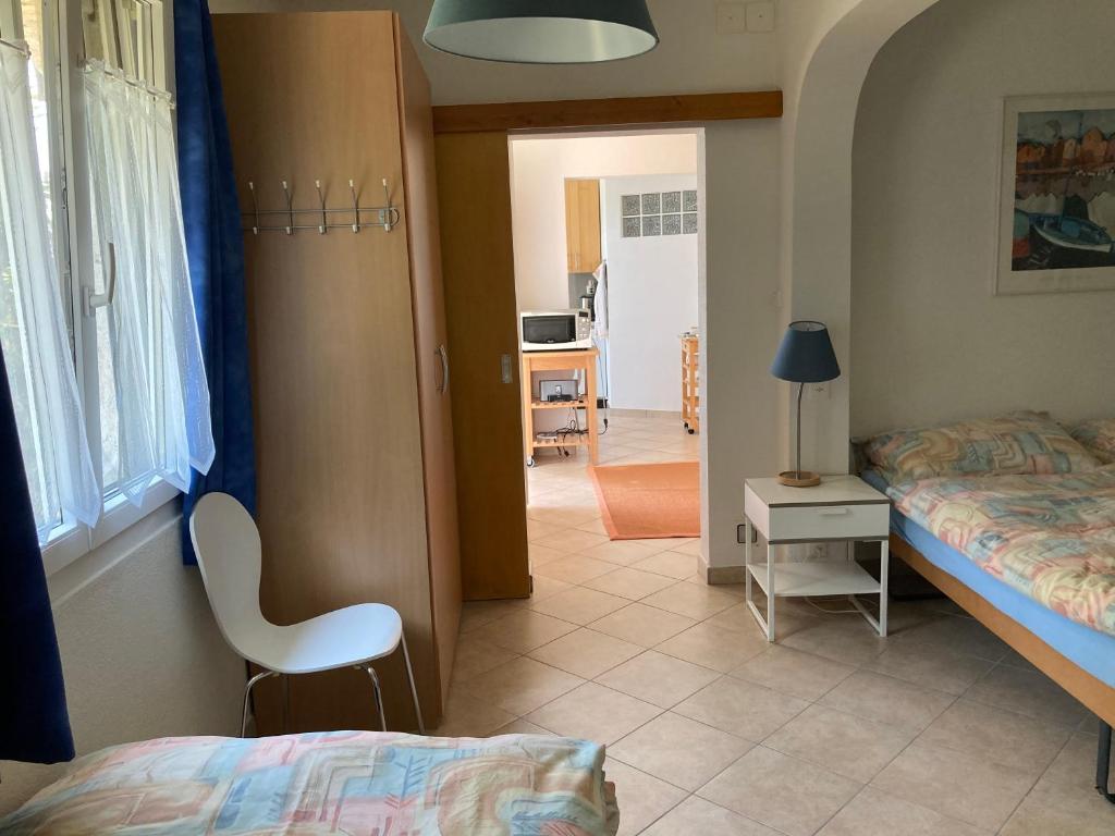 Postel nebo postele na pokoji v ubytování Appartamento di vacanza tra i vigneti