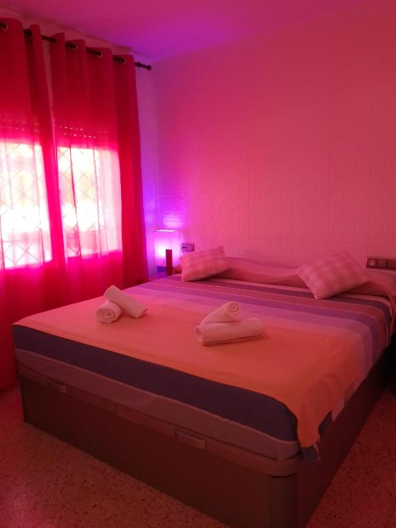 Posteľ alebo postele v izbe v ubytovaní Rooms Pineda