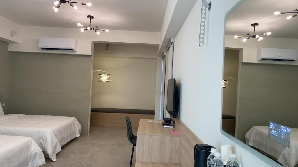Postel nebo postele na pokoji v ubytování Shui Shang Yuan Homestay