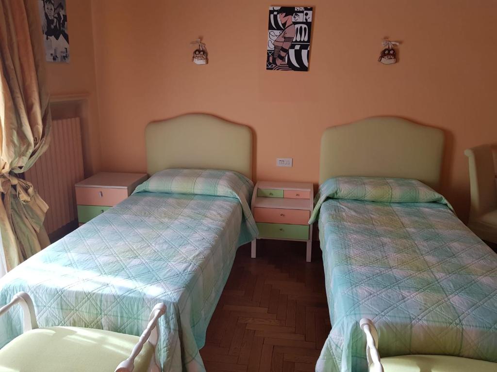 En eller flere senge i et værelse på B&B Borgo Antico
