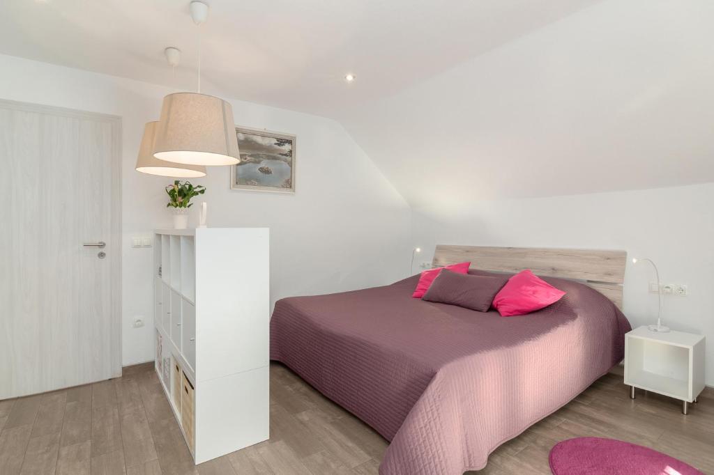 Postel nebo postele na pokoji v ubytování Apartments Fine Stay Slovenia