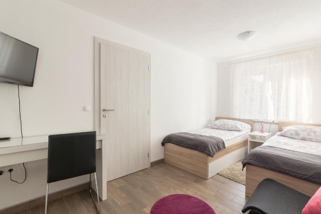 Postel nebo postele na pokoji v ubytování Apartments Fine Stay Slovenia