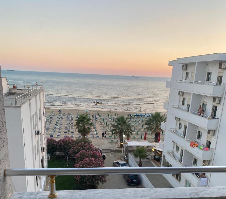 a view of the ocean from the balcony of a building at Zani’s Apartments in Durrës