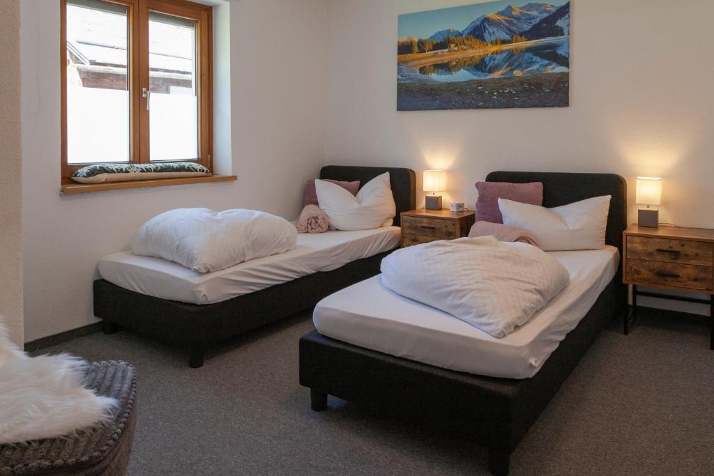 Postel nebo postele na pokoji v ubytování Berghotel TheLounge