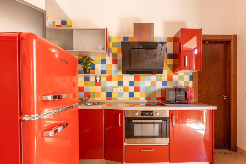 Kuchyň nebo kuchyňský kout v ubytování Living4Malaga La Dolce Vita Duplex