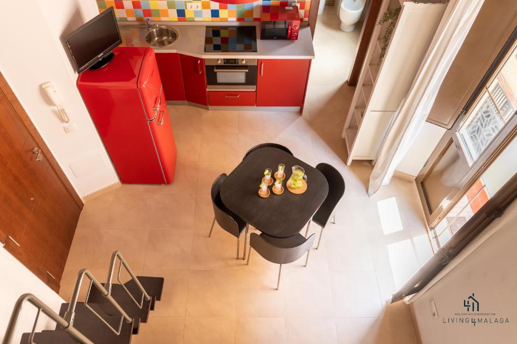 Kuchyň nebo kuchyňský kout v ubytování Living4Malaga La Dolce Vita Duplex