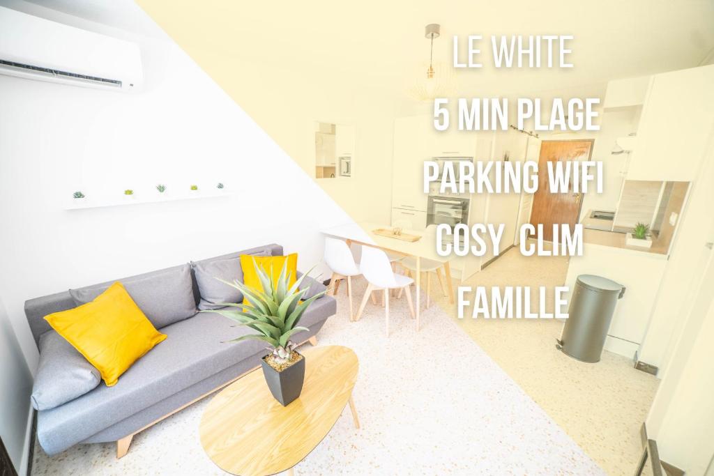 un salon avec un canapé et une table dans l'établissement LE WHITE - CLIM PARKING WIFI 5min PLAGE NEUF 6MAX -TOP PROS SERVICESConciergerie, à La Grande Motte