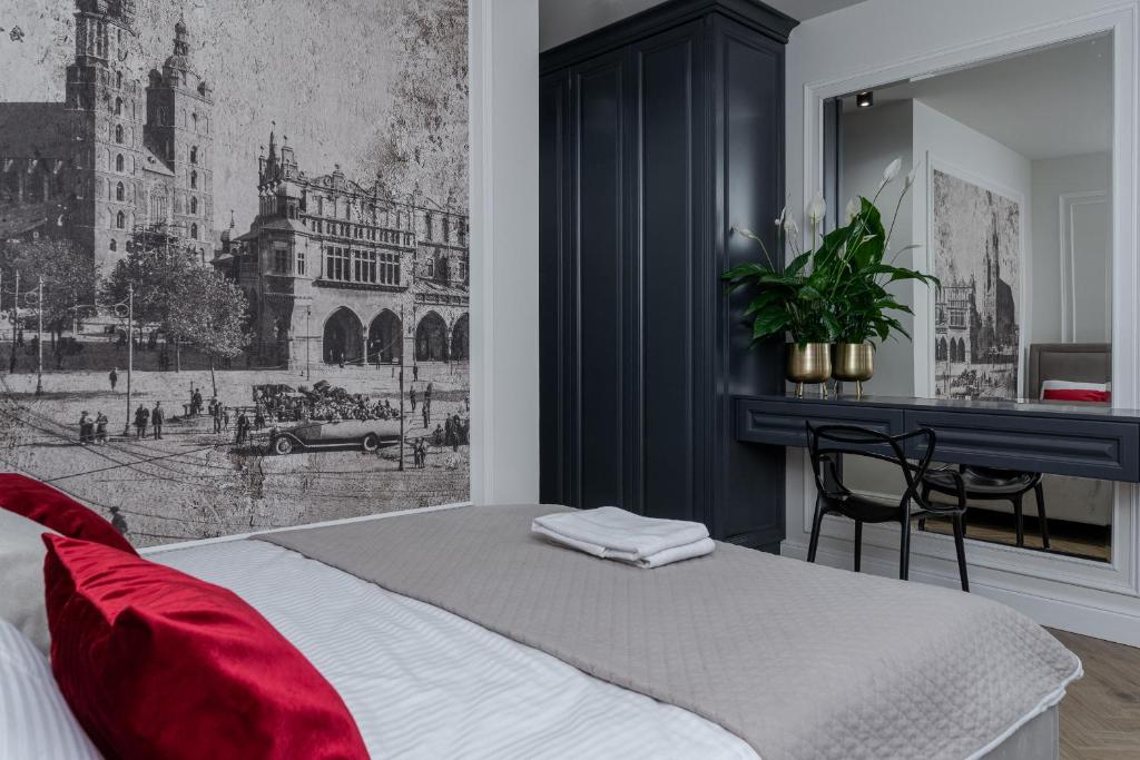 Posteľ alebo postele v izbe v ubytovaní Apartament w centrum Krakowa 109