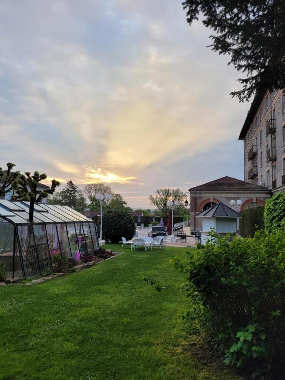 Zahrada ubytování Hôtel Cosmos & Spa