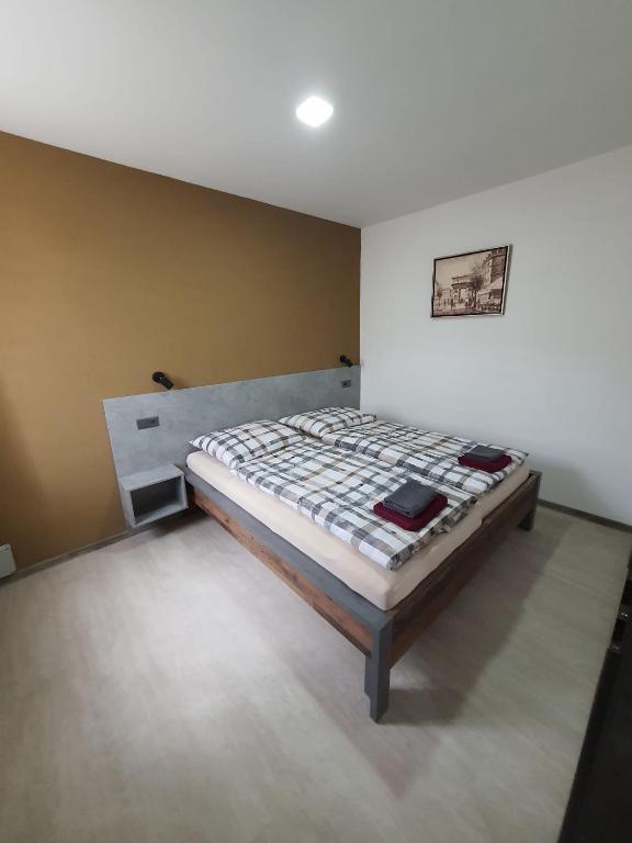 Postel nebo postele na pokoji v ubytování Penzion TOŠA