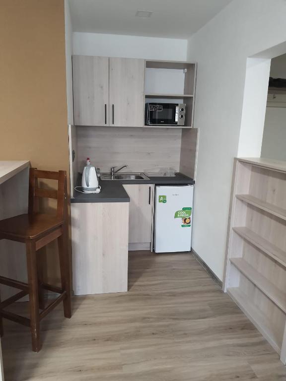 Kuchyň nebo kuchyňský kout v ubytování Penzion TOŠA