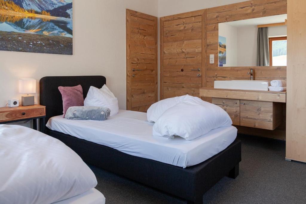 Postel nebo postele na pokoji v ubytování Berghotel TheLounge