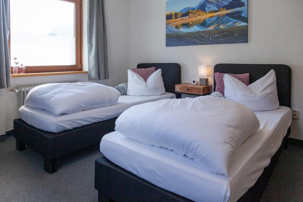 Postel nebo postele na pokoji v ubytování Berghotel TheLounge