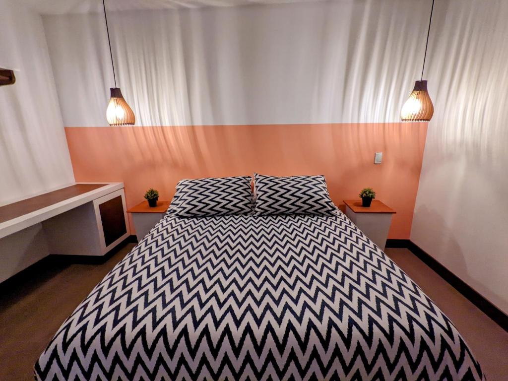 Postel nebo postele na pokoji v ubytování OFF HOSTEL