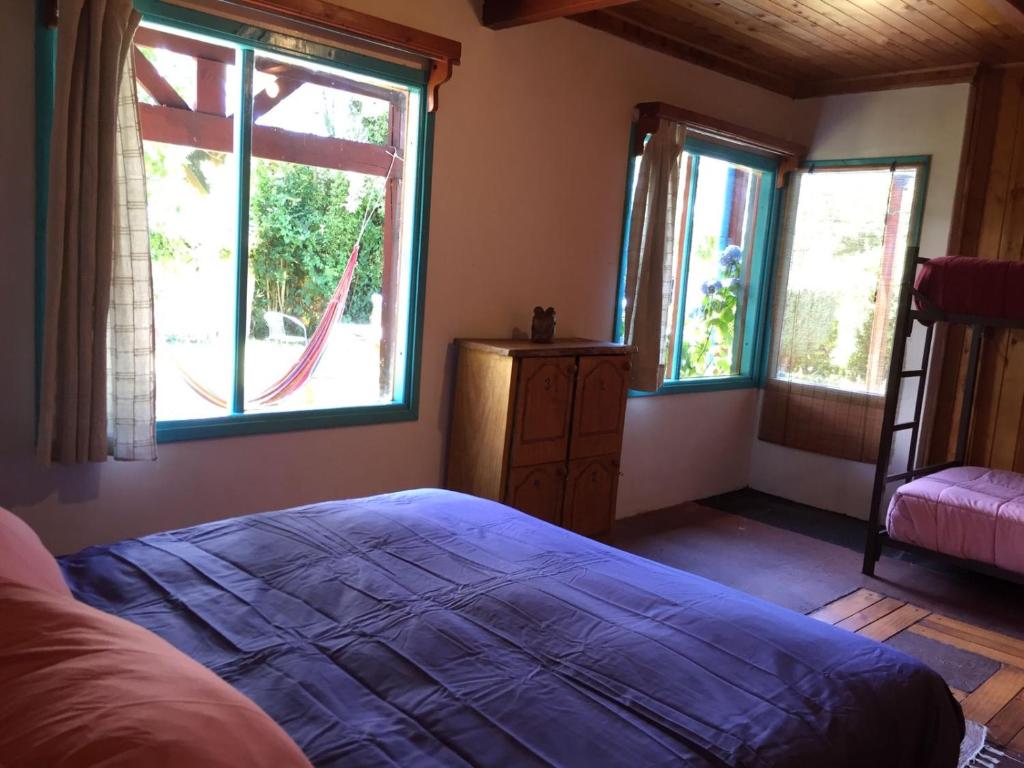 Uma cama ou camas num quarto em Hostel Raíz