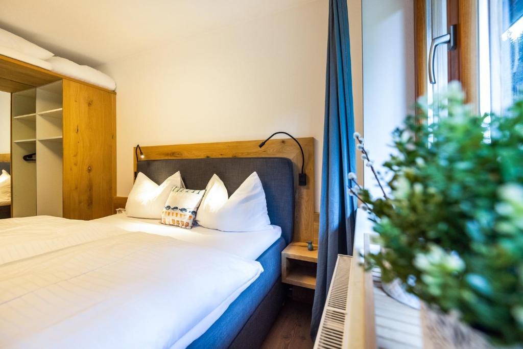 Postel nebo postele na pokoji v ubytování Urlaubsparadies Bogenhof - 5 Minuten zum Lift