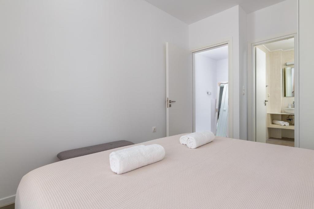 Postel nebo postele na pokoji v ubytování Gennadi Harmony Suites - 200 m from the sea