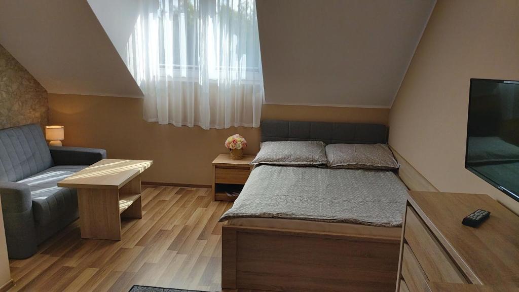 Postel nebo postele na pokoji v ubytování Willa Sternik