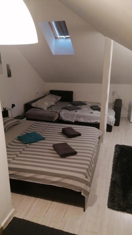 Postel nebo postele na pokoji v ubytování Vila ANA