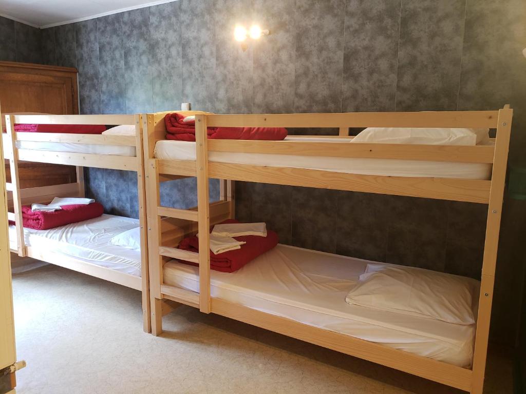 Postel nebo postele na pokoji v ubytování Hébergement Artense