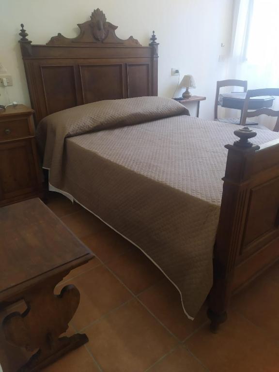 Postel nebo postele na pokoji v ubytování Camere le cascatelle