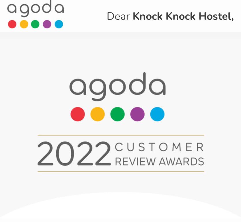 a closer look at the customer review awards logos at Knock Knock Hostel in Kaohsiung