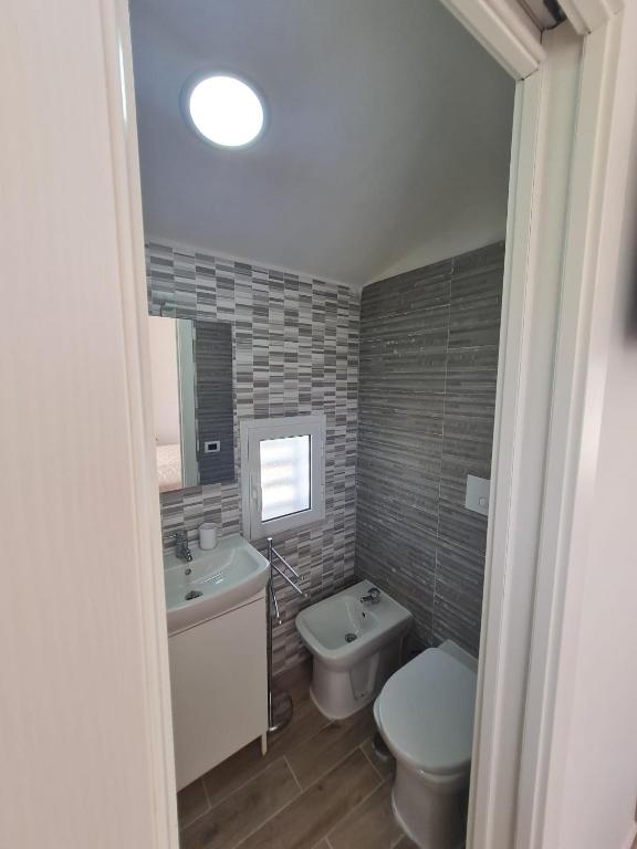 Koupelna v ubytování Scauri Rooms B&B