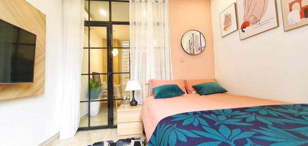 a bedroom with a bed in a room at LaHomestay Phủ Doãn in Hanoi