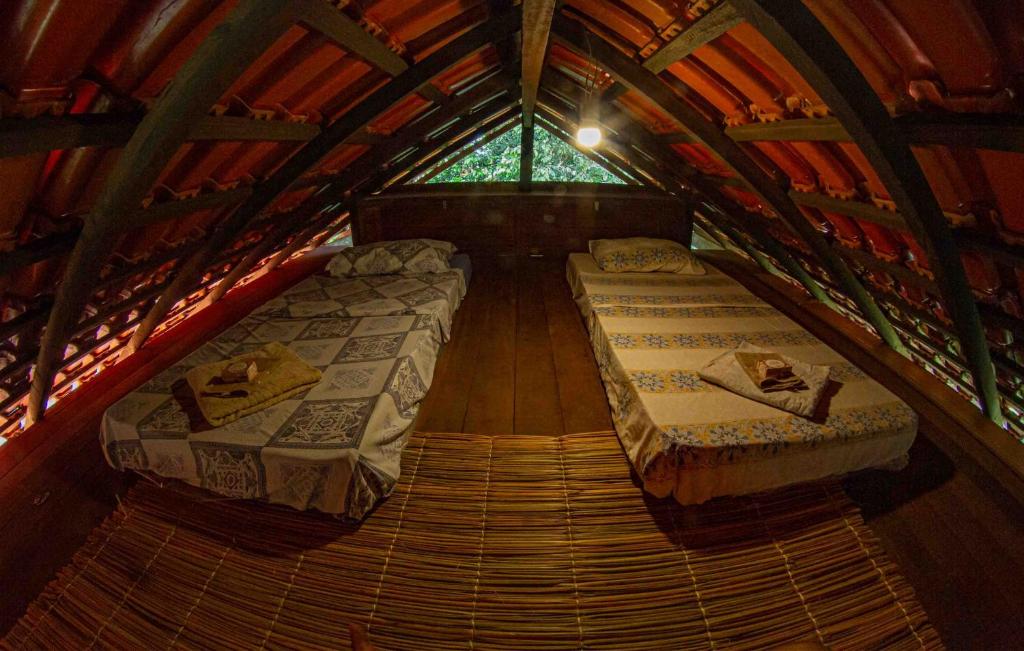 Postel nebo postele na pokoji v ubytování Casa Curuá