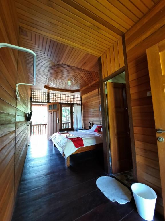 Postel nebo postele na pokoji v ubytování HOTEL BESAR BULAN BARU - Senggigi